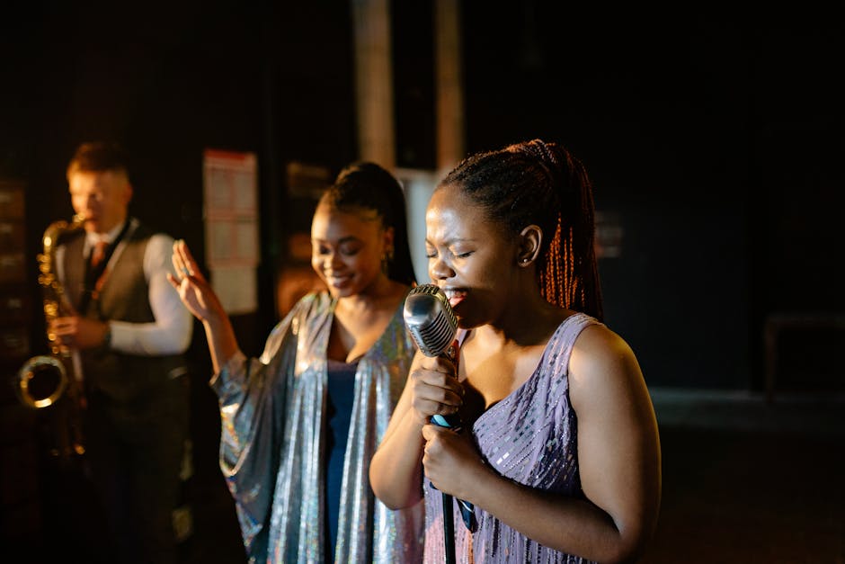 Vocalist sings passionately with saxophonist in a lively jazz performance.